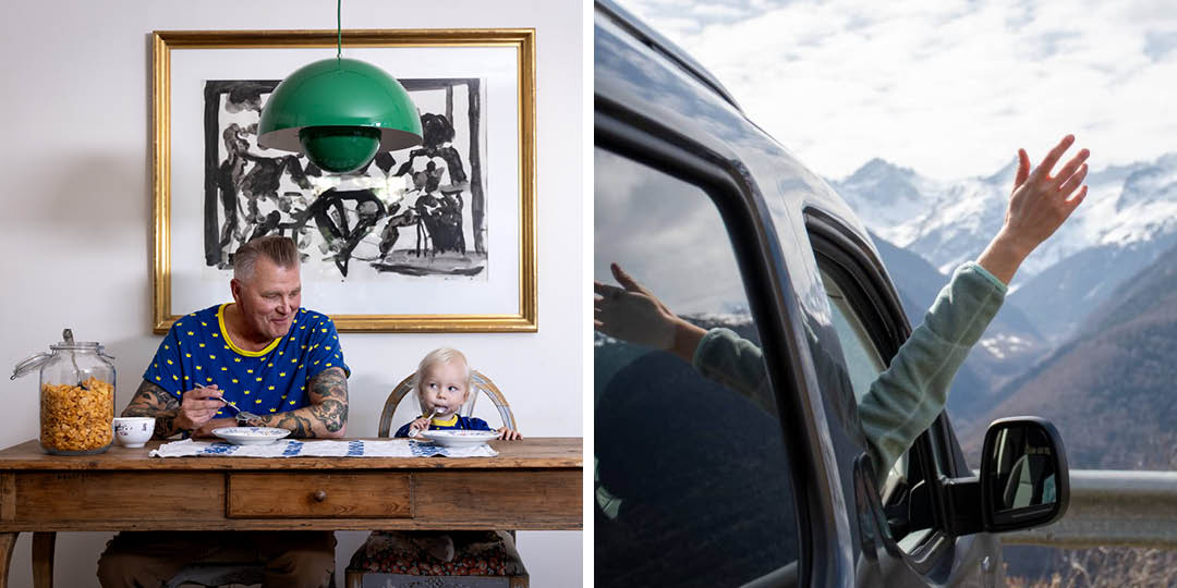En man och ett barn äter frukost vid ett bord. En person sticker ut handen genom fönstret på en husbil