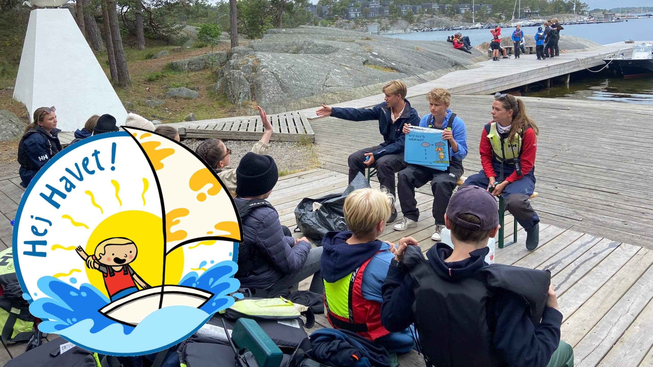 BÅTMAT 3 Båtmässan 2026.pdf undervisar unga nära brygga